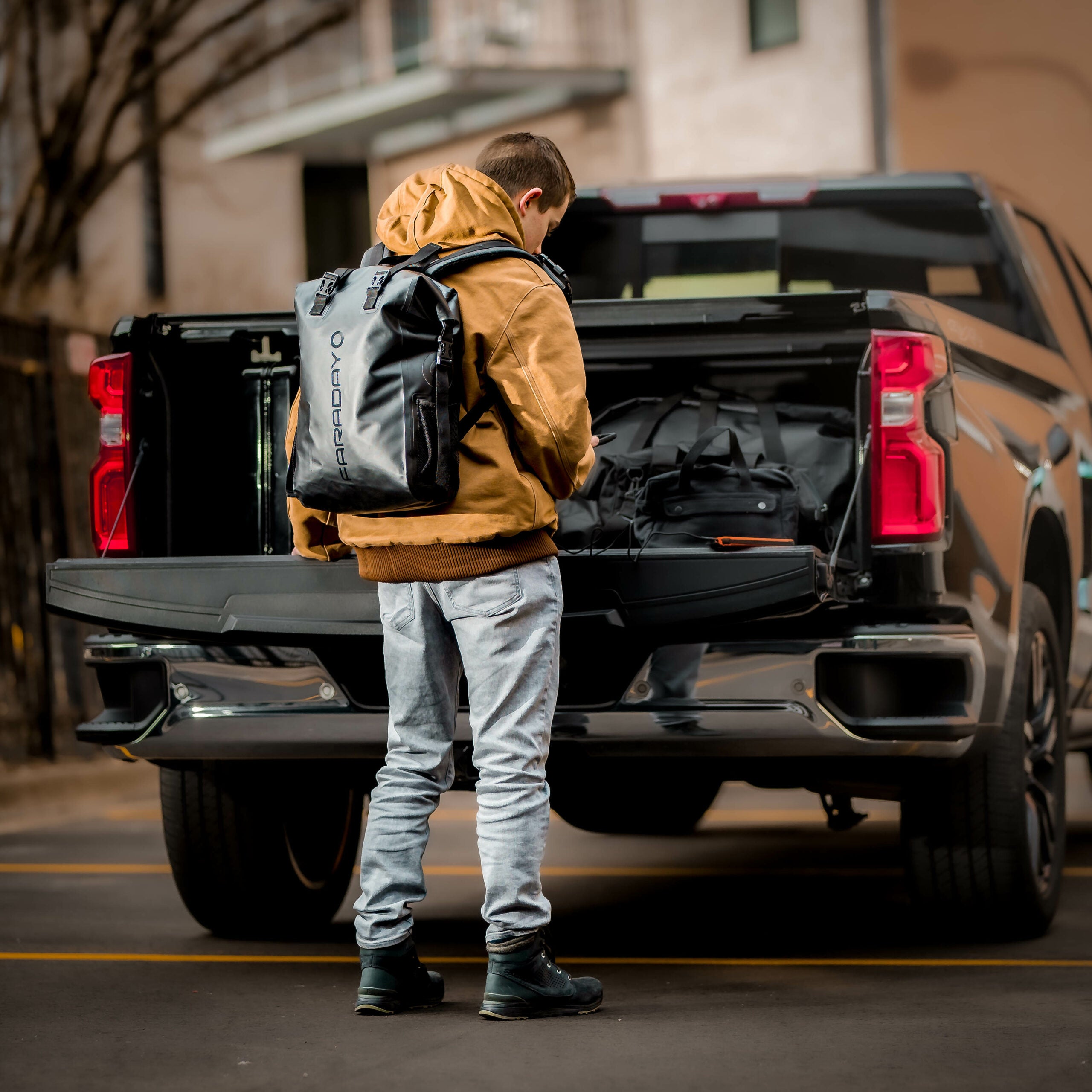 Faraday Dry Bag Backpack NX3 3pc Kit Secure Waterproof EMP and EMP Digital Protection alternative perspective showing versatile application options for electromagnetic pulse protection and security