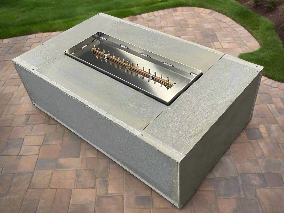 Warming Trends 60"x36" Rectangular Ready to Finish Fire pit Kit 150,000 BTU CROSSFIRE® Burner unfinished in a back yard