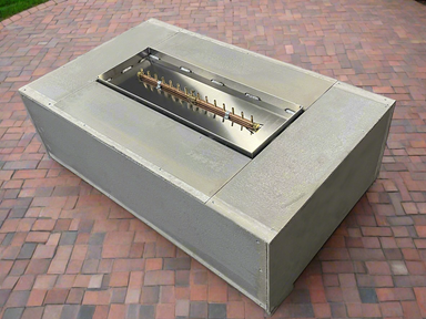 Unfinished Warming Trends 72"x42" Rectangular Ready to Finish Fire pit Kit 150,000 BTU Linear CROSSFIRE® Burner outside