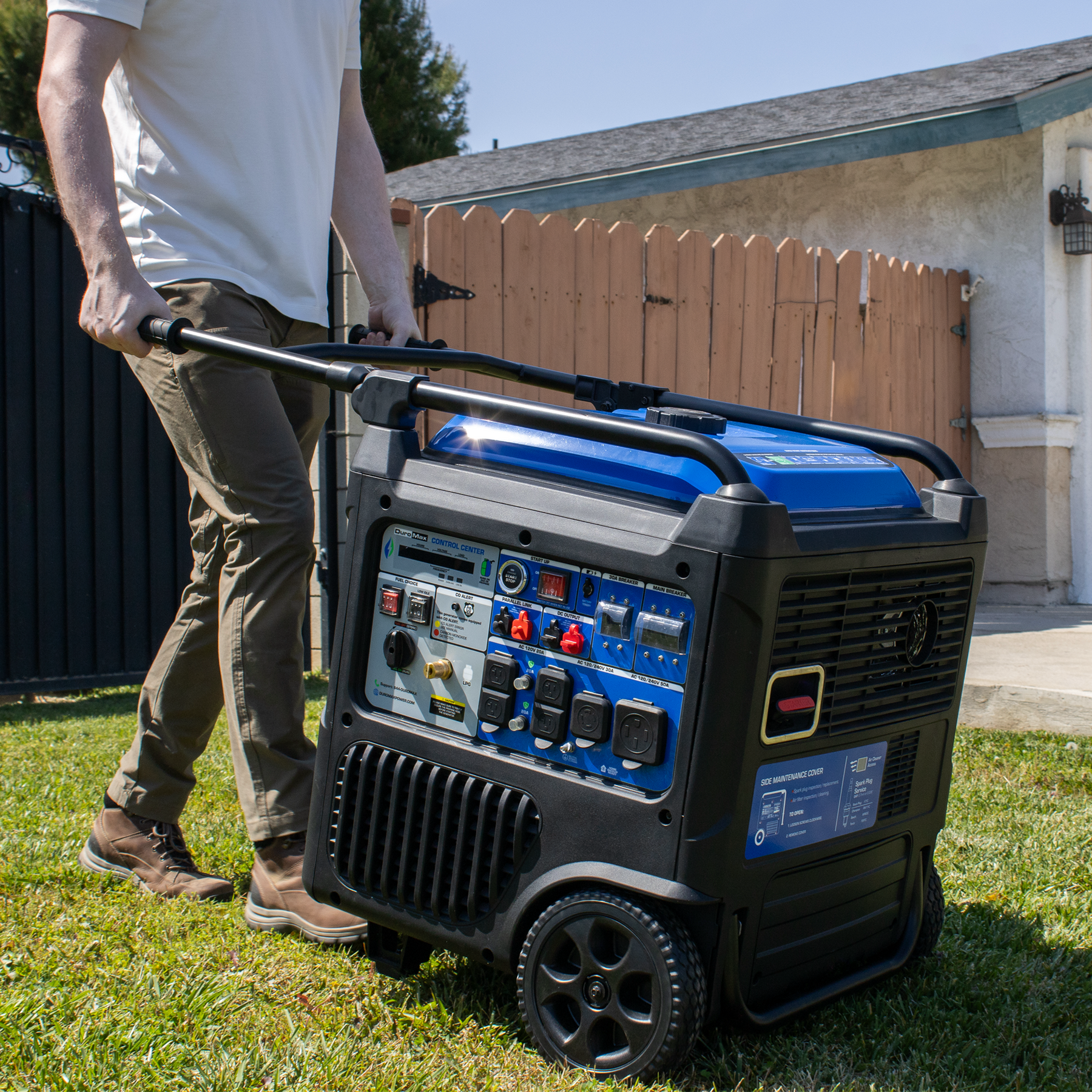 DuroMax XP11000iH 11000 Watt Portable Dual Fuel Inverter Generator rear view showing exhaust system and cooling vents for quiet reliable operation